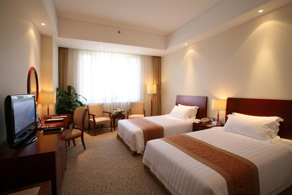 Kingswell Hotel Tongji Xangai Quarto foto